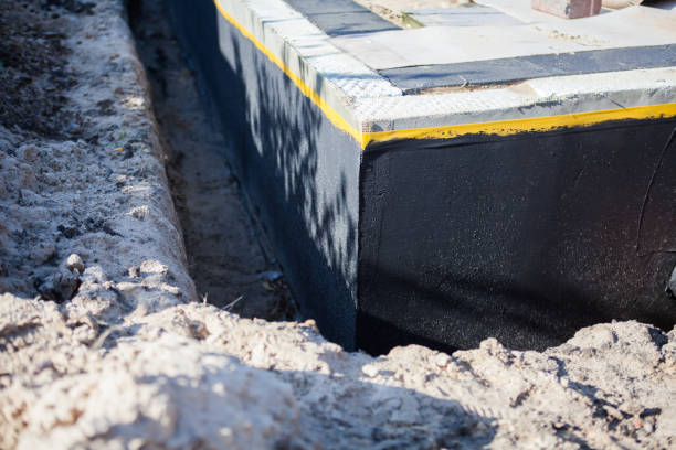Professional Waterproofing technician working in Monroe, WI